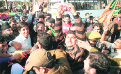 Activists of the Bharatiya Janata Yuva Morcha hold a protest in Jammu on Tuesday on the 10th anniversary of the Parliament attack
