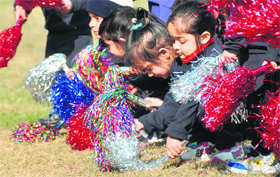 Students of Kangaroo Kids School present a dance during their sports day at Guru Nanak Stadium in Ludhiana.