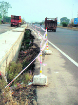 The deep pits dug up on NH-I for widening of roads. 