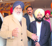 Chief Minister PS Badal with SAD MLA Manjinder Singh Kang at his house in Amritsar.