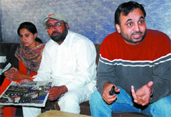 Bhagwant Mann along with Pritpal Singh and Varinderpal Kaur interacts with media persons in Bathinda on Wednesday