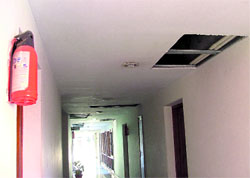 A fire extinguisher hanging in front of a room at the Circuit House in Ludhiana