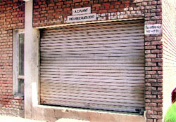 The locked storeroom where the hose pipe is kept