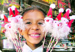 A girl is all smiles during Christmas shopping in Ludhiana