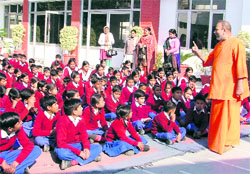 Students of DRSP Vidya Mandir listen to a guest lecturer in Ludhiana