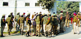 Heavy police force deputed outside the District Congress Committee office in Amritsar on Thursday.