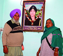 Kargil martyr Sandeep Singhs parents at their residence in Partap Nagar in Bathinda.
