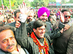 Navjot Singh Sidhu campaigns with BJP candidate Sourabh Joshi at Sector 15 in Chandigarh on Thursday