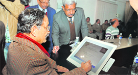Chief Minister BC Khanduri inaugurates a software which will facilitate disbursal of pension for the aged in Dehradun on Thursday.