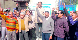 Workers of the BSNL hold a protest in Dehradun on Thursday.