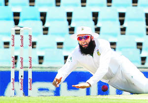 South Africas Hashim Amla misses the ball as he attempts to run out Mahela Jayawardene (not pictured) in Centurion on Thursday. 