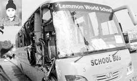 The school bus that had a head-on collision with a college bus, which claimed the life of six-year-old Jaskaran Singh (inset), at Chunni village, near Fatehgarh Sahib, on Friday.