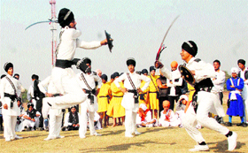 Students perform in the state-level gatka competition organised by Punjab School Education Board at Paragon School, Sector 71, Mohali, on Friday.