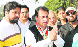 Congress candidate HS Lucky campaigns in Sector 20, Chandigarh, on Friday.