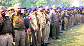 Chandigarh Police personnel line up for a briefing on their duties in MC elections in Chandigarh on Friday.