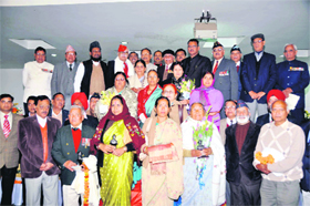Award-winning soldiers of the 1971 war and members of their families at a function to mark Vijay Diwas in Dehradun on Friday.