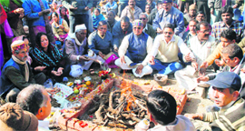 Striking Class IV employees hold a yajna at Parade Ground in Dehradun on Friday to put pressure on the state government to accept their demands.