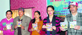 Madhu Chauhan (second from right), Chairperson of Dehradun Zila Panchayat, releases a Garhwali album at a function in Dehradun on Friday.