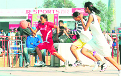 A basketball match in progress between Sangrur and Bathinda at Jakhar Sports Festival on Friday.