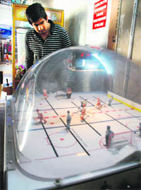 The best thing about playing table soccer is that one does not have to drive to a playground with sunscreens applied