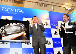 Japanese video game major Sony Compuer Entertainment (SCE) president Andrew House (R) and SCE chairman and Sony executive vice president Kazuo Hirai celebrate the new portable video game console PlayStation Vita (PS Vita) at its launch in a video game shop in Tokyo on Saturday. Sony will put the new gaming system on the market in the United States and Europe in February 2012