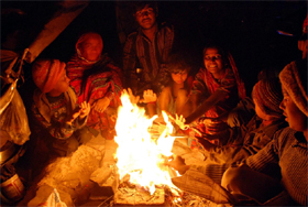 As the mercury dipped to touch 2.2 degrees Celsius, recording the lowest in th season so far in Bathinda, residents assembled around a bonfire to beat the chill.