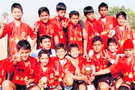 Players of St Soldier after winning Dikshant Invitational Inter-School Football Championship Trophy at Panchkula on Saturday