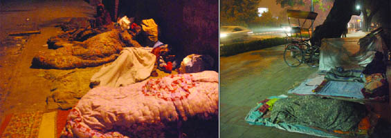 Homeless people sleeping on footpaths in New Delhi on Saturday.