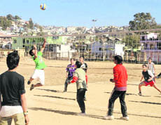 A volleyball match in progress at the rural meet held in Pithoragarh on Saturday.  
