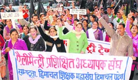 Elementary trained teachers take out a rally in Mandi on Saturday