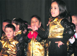 Students of Aroma Foundation Public School perform during the annual day function