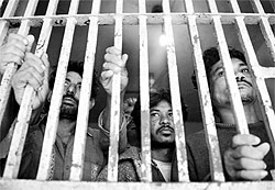 Detained Indian fishermen inside a cell at a police station in Karachi on Saturday. Pakistani authorities arrested the fishermen and seized two boats for allegedly violating the countrys territorial waters, a spokesman for the Maritime Security Agency said