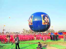 Akali Dal workers and policemen at the partys rally venue in Killi Chahal village of Moga on Saturday. 