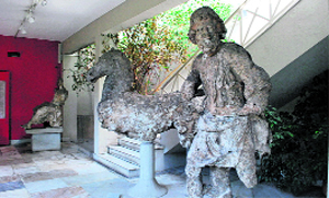 Corroded statues from the wreck.