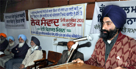 A speaker expresses his views at the public debate on electoral reforms organised at the Teachers Home in Bathinda on Sunday.
