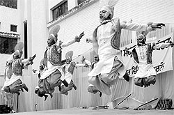 Students perform during a state-level bhangra competition at Paragon School in Sector 71, Mohali, on Sunday