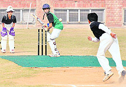 A player of DP Azad Cricket Academy plays a shot against Saupins-32 during a match at St Stephens School, Sector 45, Chandigarh, on Sunday