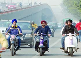 Vintage cars and bikes participate in the 21 Gun Salute Classic Parade in New Delhi on Sunday