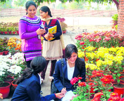 Students during a flower show at Sardar Bhagwan Singh Postgraduate Institute of Bio-medical Sciences at Balawala near Dehradun