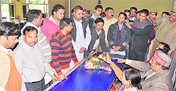 Workers of the BJYM engage in an argument with leaders of the Bharashtachar Mukti Morcha in Una on Sunday