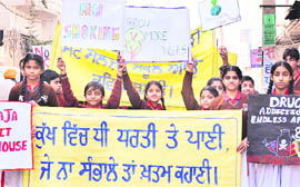 Students of St Soldier Divine Public School take out an awareness rally on female foeticide and environmental issues in Jalandhar on Sunday. 
