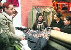 Visitors at an exhibition organised by the state Handicrafts Department in Jammu on Sunday.