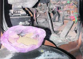 A bag containing poppy husk found from a truck after an accident in Transport Nagar, Ludhiana, on Saturday night