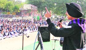 A student participates in a singing competition at Government Model School, PAU, in Ludhiana
