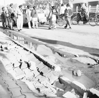 The damaged footpath with sewage overflowing near it on the Panj Sarovar Walk route in Amritsar. 
