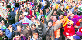 Supporters of various parties erupt in joy at the counting centre in Government Model School, Sector 10, Chandigarh, on Monday.
