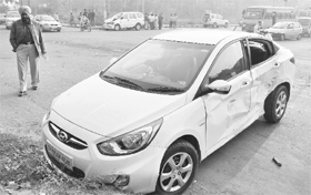 The car that collided with a Tavera at the Mandi Board traffic light point in Sector 67, Mohali, on Monday.