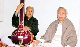 Pandit Ganesh Prasad Sharma (right) along with his son Anil in Ambala.