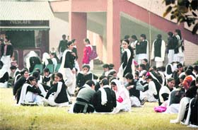 WINTER WARMTH: With the mercury dipping, students of Government College for Women, Gandhi Nagar, Jammu, enjoy sitting in the sun