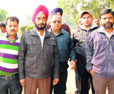 Gurdeep Singh (wearing a red turban) with members of the health employees union in Amritsar on Tuesday. 